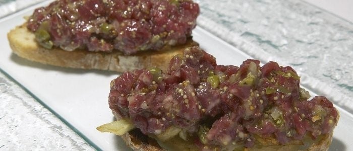 Lengua de ternera en escabeche con brotes, de La Tasquería.