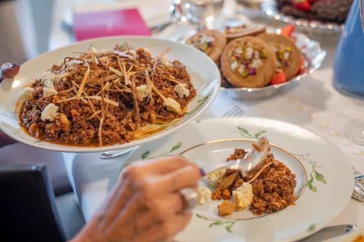 Delivery Begoístas arroz rojo con bacalao y coliflor