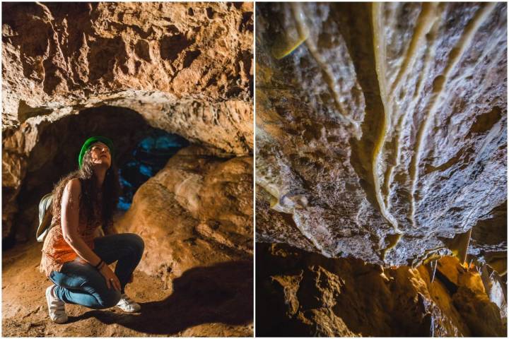 En el interior de las Cuevas de las Fuentes de León, en la provincia de Badajoz, una visitante mira el techo lleno de curiosas formaciones.